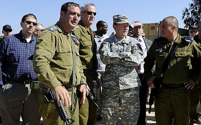 Martin Dempsey, second from right, and other officials at the Iron Dome battery site on Tuesday. (photo credit: Courtesy US Embassy Tel Aviv, via Twitter)