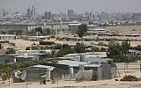 A view of the Bedouin town of Segev Shalom, with the city of Beersheba in the background (Miriam Alster/Flash90)