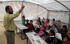 Palestinian pupils near the West Bank city of Hebron, January 2010 (photo credit: Najeh Hashlamoun/Flash 90)