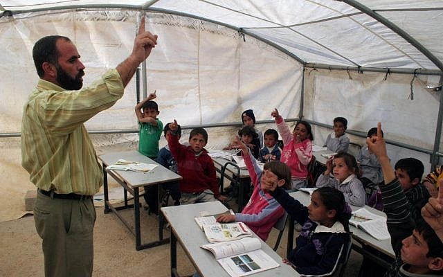 Palestinian pupils near the West Bank city of Hebron, January 2010 (photo credit: Najeh Hashlamoun/Flash 90) Palestinian pupils near the West Bank city of Hebron, January 2010 (photo credit: Najeh Hashlamoun/Flash 90)