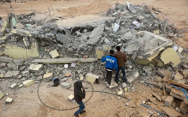 December 2010 demolition of a house in the Bedouin village of Bir al Meshash, one of approximately 45 illegal Bedouin villages in Israel. (photo credit: Jorge Novominsky/Flash90) December 2010 demolition of a house in the Bedouin village of Bir al Meshash, one of approximately 45 illegal Bedouin villages in Israel. (photo credit: Jorge Novominsky/Flash90)