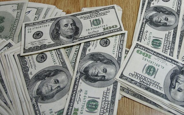 Illustration of US dollar bills. (photo credit: Abed Rahim Khatib/Flash 90)