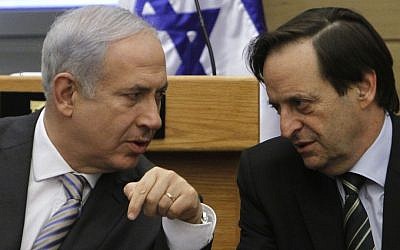 Then Prime Minister Benjamin Netanyahu (left) and Likud Minister Dan Meridor at a party meeting in the Knesset in September 2011. (Miriam Alster/Flash90)