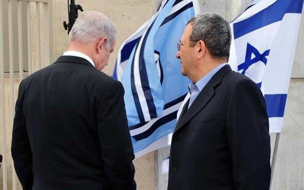 Prime Minister Benjamin Netanyahu and Defense Minister Ehud Barak seen at the arrival ceremony of captured Israeli soldier Gilad Shalit at the Tel Nof air force base, October 18, 2011. (Ariel Hermoni/Ministry of Defense/Flash90)