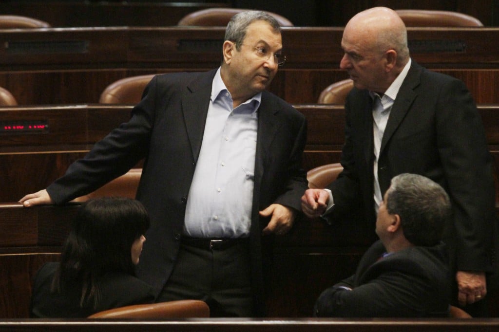 Are they discussing their political future? Ehud Barak chatting with fellow Atzmaut party members last year. (photo credit: Uri Lenz/Flash90)