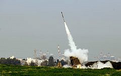 Iron Dome system in action as it intercepts rockets fired from Gaza in October 2012 (photo credit: Flash90/File)