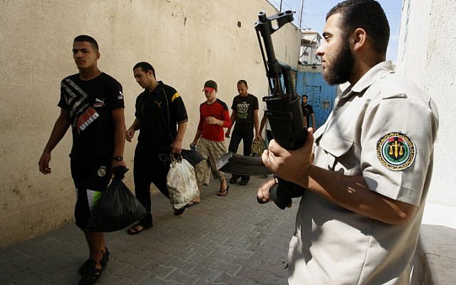 Palestinian prisoners wait to be released from prison in Gaza, July 2012. (Abed Rahim Khatib / Flash 90) Palestinian prisoners wait to be released from prison in Gaza, July 2012. (Abed Rahim Khatib / Flash 90)