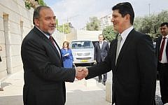 Romanian Foreign Minister Titus Corlatean (R) meets with Foreign Minister Avigdor Liberman in Jerusalem. (photo credit: Miriam Alster/Flash90)