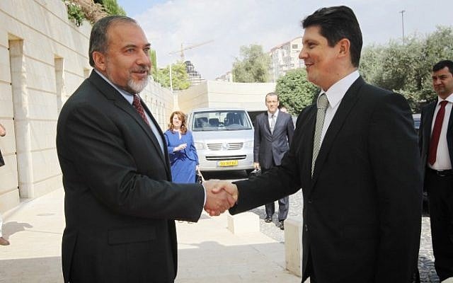 Romanian Foreign Minister Titus Corlatean (R) meets with Foreign Minister Avigdor Liberman in Jerusalem. (photo credit: Miriam Alster/Flash90) Romanian Foreign Minister Titus Corlatean (R) meets with Foreign Minister Avigdor Liberman in Jerusalem. (photo credit: Miriam Alster/Flash90)