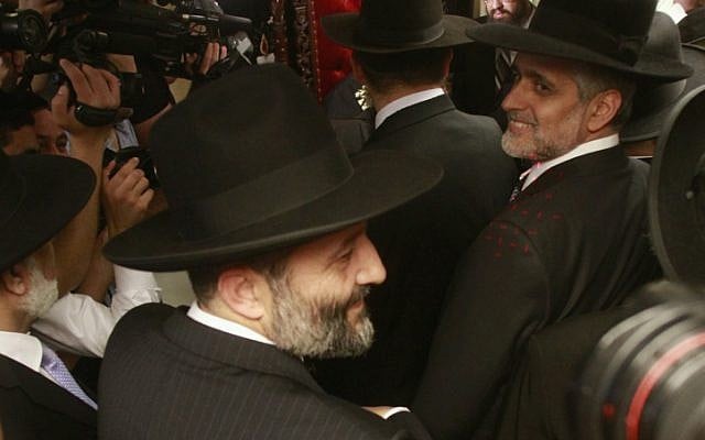 Shas party titans Eli Yishai (right) and Aryeh Deri (left) on October 14. (photo credit: Oren Nahshon/Flash90)