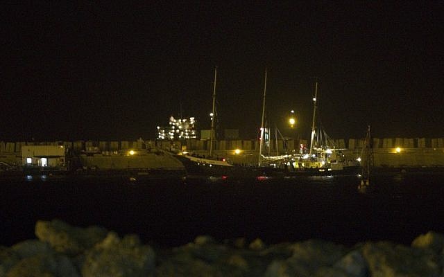 The Swedish-owned, Finnish-flagged vessel Estelle is escorted by Israeli naval police into the port of Ashdod on Saturday (photo credit: Tsafrir Abayov/Flash90) The Swedish-owned, Finnish-flagged vessel Estelle is escorted by Israeli naval police into the port of Ashdod on Saturday (photo credit: Tsafrir Abayov/Flash90)