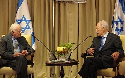 Jimmy Carter meeting with Shimon Peres on Sunday. (photo credit: Mark Neyman/GPO/Flash 90)