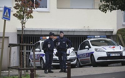 Riot police officers guard a parking lot in Torcy, east of Paris Wednesday, Oct.10, 2012 where police found bomb-making material after police broke up a suspected terrorist cell last week (photo credit: AP/Thibault Camus)