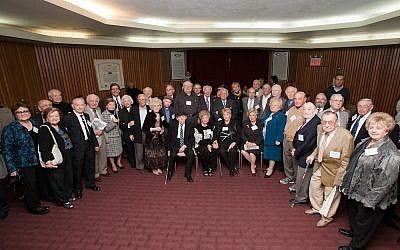 Nearly five dozen former resistance fighters -- nearly all in their 80s or older -- celebrate their reunion in New York City in November 2011. (Photo credit: Ron Glassman Photography)