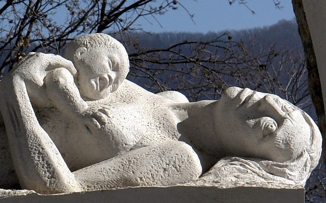 This sculpture of a woman and her baby killed by Nazi soldiers commemorates the massacre in the Italian village of Sant'Anna di Stazzema on August 12, 1944 (photo credit: CC-BY-SA-3.0, by Cesar, Wikimedia Commons)