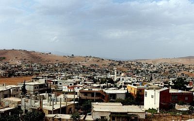 A view of Arsal, a Sunni Muslim town in eastern Lebanon near the Syrian border that has become a safe haven for war-weary Syrian rebels, a way station for wounded fighters and home to hundreds of frightened Syrian refugee families (photo credit: AP Photo/Bilal Hussein)