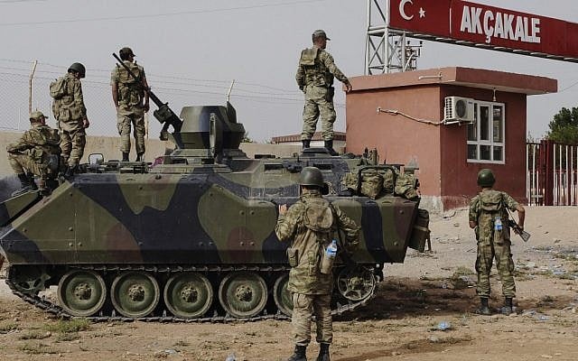 A Turkish military station at the border gate with Syria, October 7 (photo credit: AP)