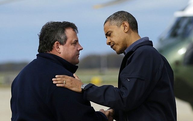President Barack Obama is greeted by New Jersey Gov. Chris Christie upon his arrival at Atlantic City International Airport, Wednesday, October 31, 2012, in Atlantic City, New Jersey (photo credit: Pablo Martinez Monsivais/AP) President Barack Obama is greeted by New Jersey Gov. Chris Christie upon his arrival at Atlantic City International Airport, Wednesday, October 31, 2012, in Atlantic City, New Jersey (photo credit: Pablo Martinez Monsivais/AP)