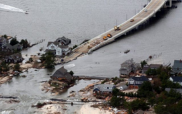 The view of storm damage over the Atlantic Coast in Seaside Heights, N.J., Wednesday, Oct. 31, 2012, from a helicopter traveling behind the helicopter carrying President Obama and New Jersey Gov. Chris Christie, as they viewed storm damage from superstorm Sandy. (photo credit: Doug Mills/AP/Pool)