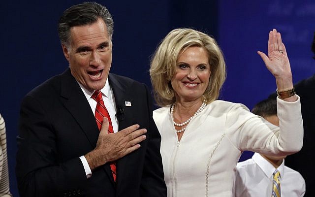 Republican presidential nominee Mitt Romney and his wife Ann wave toward the audience after the first presidential debate at the University of Denver, Wednesday, Oct. 3, 2012, in Denver. (photo credit: Charlie Neibergall/AP)