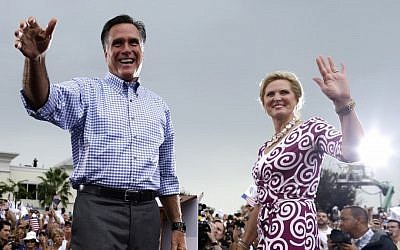 Republican presidential candidate and former Massachusetts governor Mitt Romney and wife Ann campaign in Florida on Sunday (photo credit: AP/Charles Dharapak)