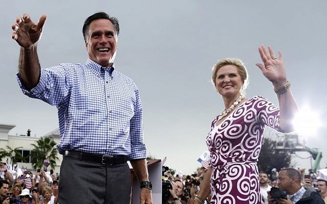 Republican presidential candidate and former Massachusetts governor Mitt Romney and wife Ann campaign in Florida on Sunday (photo credit: AP/Charles Dharapak)