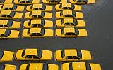 Taxis in a flooded parking lot in Hoboken, New Jersey. (AP/Charles Sykes)