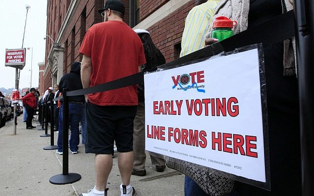 Illustrative: Voters stand in line outside the Hamilton County Board of Elections for early voting, in Cincinnati, Ohio, October 22, 2012. (AP/Al Behrman) Illustrative: Voters stand in line outside the Hamilton County Board of Elections for early voting, in Cincinnati, Ohio, October 22, 2012. (AP/Al Behrman)