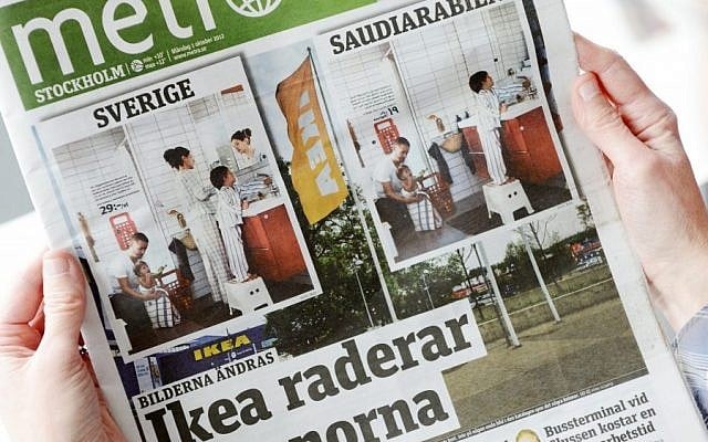 Person holds the Monday issue of daily Metro fronted with two images from Swedish and Saudi Arabian IKEA catalogue for next year. Ikea is being criticized for deleting images of women from the Saudi version of its furniture catalogue, a move the company says it regrets. Comparing the Swedish and Saudi versions of the Ikea catalogue, Sweden's free newspaper Metro on Monday showed that women had been airbrushed out of otherwise identical pictures showcasing the company's home furnishings. The headline reads Ikea Erase Women. (AP Photo/Scanpix Sweden/Henrik Montgomery)