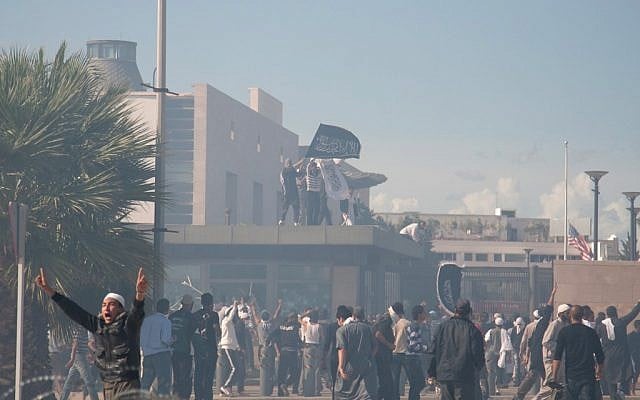 Protesters gather in front of the main entrance of the U.S. embassy in Tunis, Tunisia, on Friday, Sept. 14, 2012 (photo credit: AP/Amine Landoulsi) Protesters gather in front of the main entrance of the U.S. embassy in Tunis, Tunisia, on Friday, Sept. 14, 2012 (photo credit: AP/Amine Landoulsi)