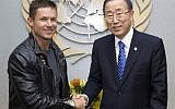 Austrian skydiver, base jumper and daredevil Felix Baumgartner, left, and United Nations Secretary General Ban Ki-moon pose for photographers at United Nations Headquarters, Tuesday, Oct. 23, 2012. (photo credit: The United Nations, Rick Bajornas/AP)