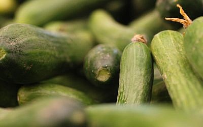 Fresh cucumbers at the market  (photo credit: Oren Fixler/Flash90)