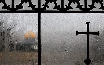 View of the Dome of the Rock, as seen from a window of the Dominus Flevit church in the Old City of Jerusalem (photo credit: Nati Shohat/Flash90)
