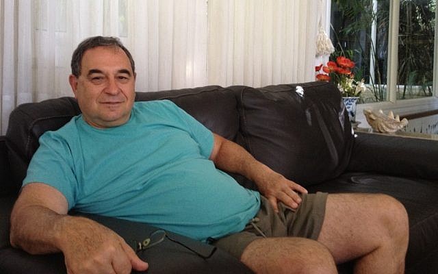 Amos Danieli in his home in Karmei Yosef (Mitch Ginsburg/Times of Israel)
