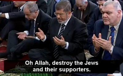 President Mohammed Morsi at prayer on October 19 at el-Taneim Mosque in Matrouh governorate (photo credit: MEMRI screenshot)