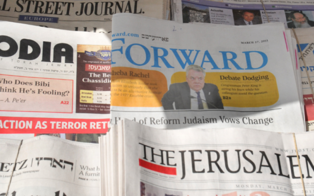 A close-up of newspapers on sale at a stand in Israel (photo credit: Sophie Gordon/Flash 90) A close-up of newspapers on sale at a stand in Israel (photo credit: Sophie Gordon/Flash 90)