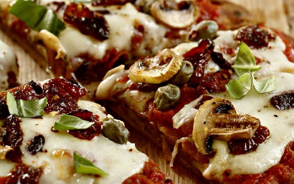 Phyllis Glazer's pan pizza (photo credit: Dania Weiner/Courtesy Modan Publishers) Phyllis Glazer's pan pizza (photo credit: Dania Weiner/Courtesy Modan Publishers)