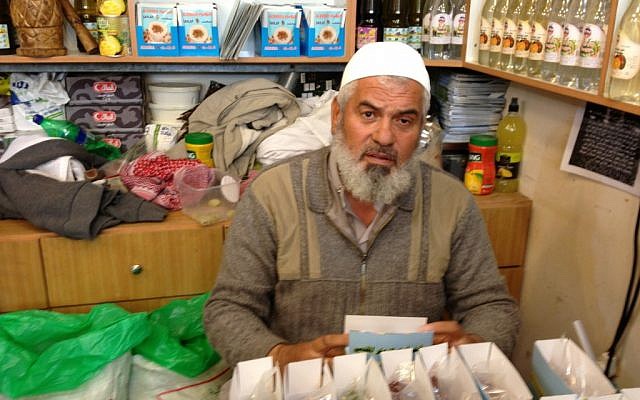 Izz A-Din Shiekh Qassim, a spice vendor in Jerusalem's Old City, November 22 (photo credit: Elhanan Miller/Times of Israel)