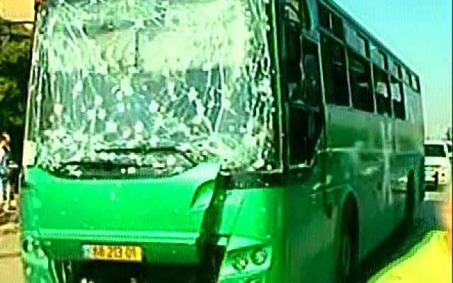 A Beersheba bus that was damaged by rocket fire from Gaza, Tuesday (photo credit: Channel 2 screen capture) A Beersheba bus that was damaged by rocket fire from Gaza, Tuesday (photo credit: Channel 2 screen capture)