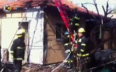 A house in the Be'er Tuvia region that sustained a direct hit from a rocket on Wednesday (photo credit: Channel 10 screen capture) A house in the Be'er Tuvia region that sustained a direct hit from a rocket on Wednesday (photo credit: Channel 10 screen capture)