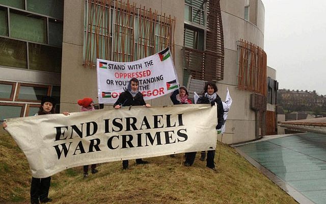 An illustrative photo of Pro-Palestinian activists on the Scottish Parliament building (photo credit: screen capture/We Are All Hana Shalabi/Facebook)
