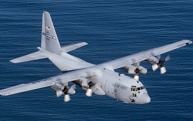Illustrative. A Lockheed C-130E Hercules flying over the Atlantic Ocean. (US Air Force/ Wikimedia Commons) Illustrative. A Lockheed C-130E Hercules flying over the Atlantic Ocean. (US Air Force/ Wikimedia Commons)