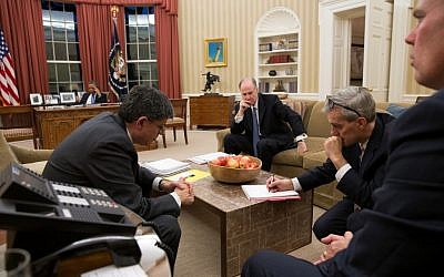 Barack Obama talks on the phone with Mohammed Morsi in the Oval Office while Chief of Staff Jack Lew, National Security Advisor Tom Donilon, and Deputy National Security Advisor Denis McDonough listen in last week. (photo credit: Pete Souza/Official White House Photo)