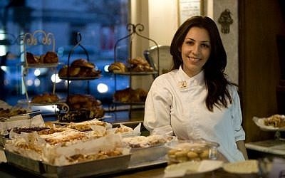 Keren Kadosh and her trays of home-baked goods (Courtesy Cafe Kadosh) Keren Kadosh and her trays of home-baked goods (Courtesy Cafe Kadosh)