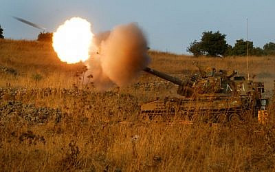 An artillery piece in the north of Israel firing a shell in a 2006 drill. (Illustrative photo: Olivier Fitoussi /Flash90)