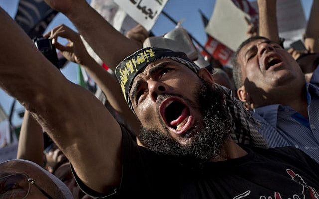 Egyptian Muslims shout Islamic slogans during a rally in Tahrir Square in Cairo in 2012. Thousands of ultraconservative Muslims rallied in the Egyptian capital, demanding the country's new constitution be based on the rulings of Islamic law, or Sharia. (AP Photo/Bernat Armangue) Egyptian Muslims shout Islamic slogans during a rally in Tahrir Square in Cairo in 2012. Thousands of ultraconservative Muslims rallied in the Egyptian capital, demanding the country's new constitution be based on the rulings of Islamic law, or Sharia. (AP Photo/Bernat Armangue)