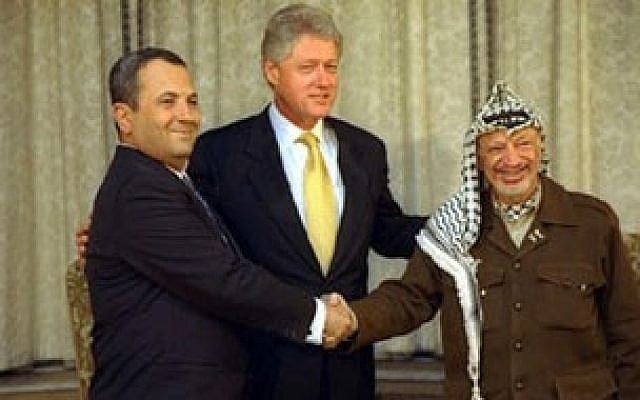 Ehud Barak, left, with Bill Clinton and Yasser Arafat (photo credit: Sharon Farmer)