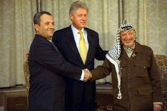 Ehud Barak, left, with Bill Clinton and Yasser Arafat (photo credit: Sharon Farmer) Ehud Barak, left, with Bill Clinton and Yasser Arafat (photo credit: Sharon Farmer)