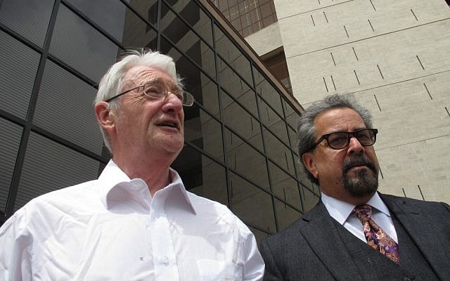 Christopher Tappin, left, leaves federal court with one of his lawyers, Kent Schaffer, in El Paso, Texas on Thursday (photo credit: AP//Juan Carlos Llorca)
