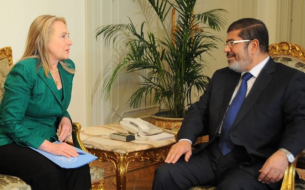 Then US Secretary of State Hillary Rodham Clinton meets with former Egyptian president Mohammed Morsi in Cairo, Egypt, Wednesday, November 21, 2012 (AP/Egyptian Presidency)